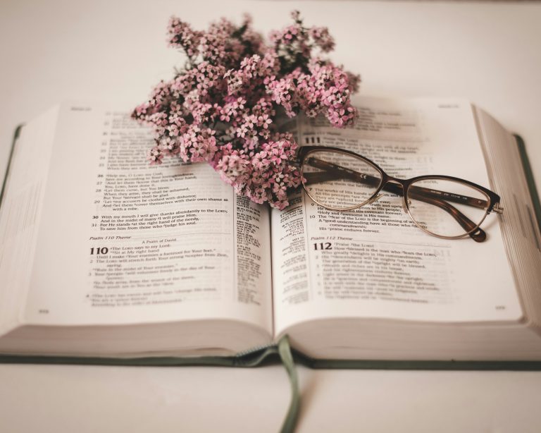 This is an image of an open Bible that can be part of having a christian life coach